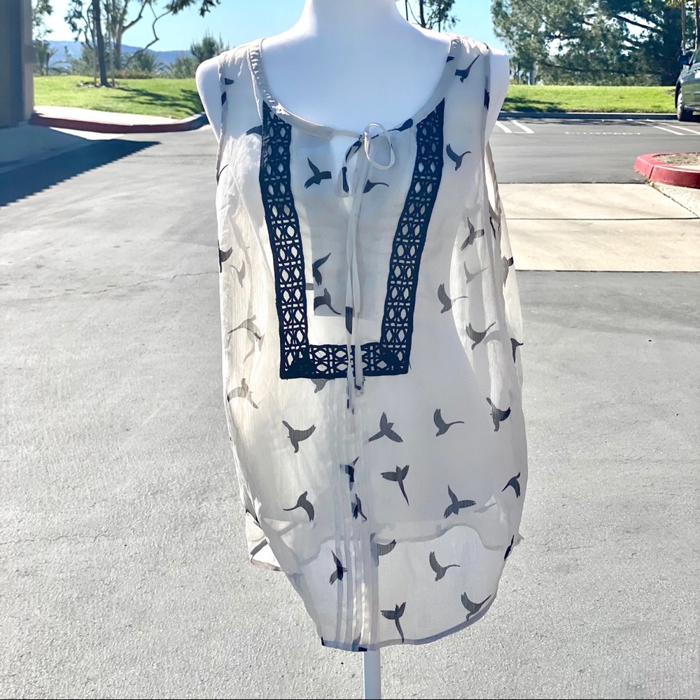 Sleeveless tie front blouse